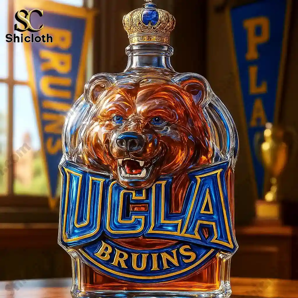 UCLA Bruins bear shaped whiskey bottle with a crown cap on a wooden table!