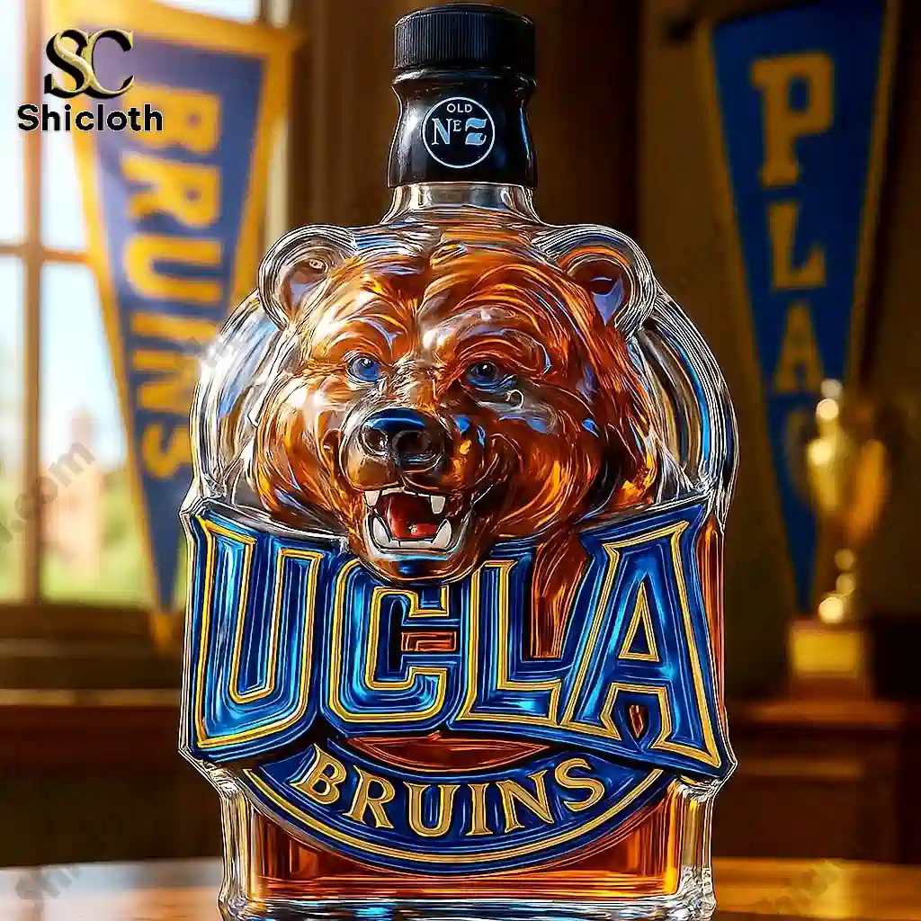 UCLA Bruins Collection Whiskey Bottle 3 UCLA Bruins bear shaped whiskey bottle with a black cap on a wooden table!