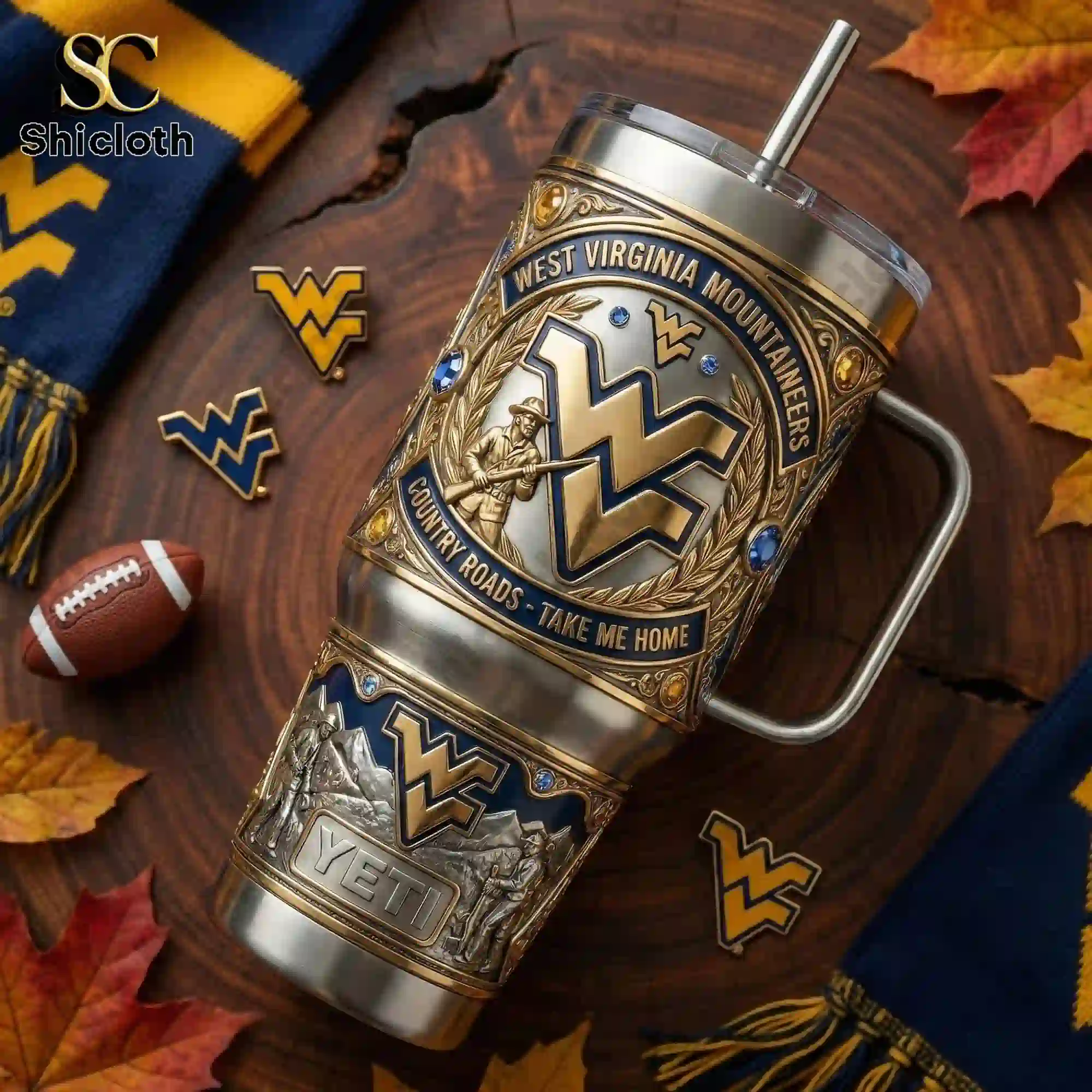West Virginia Mountaineers 40oz Tumbler With Handle 4 West Virginia Mountaineers tumbler on wooden table with football and scarves