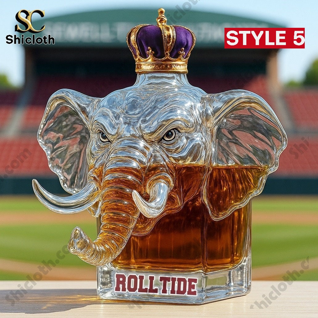Elephant head Roll Tide whiskey decanter with purple crown on stadium background
