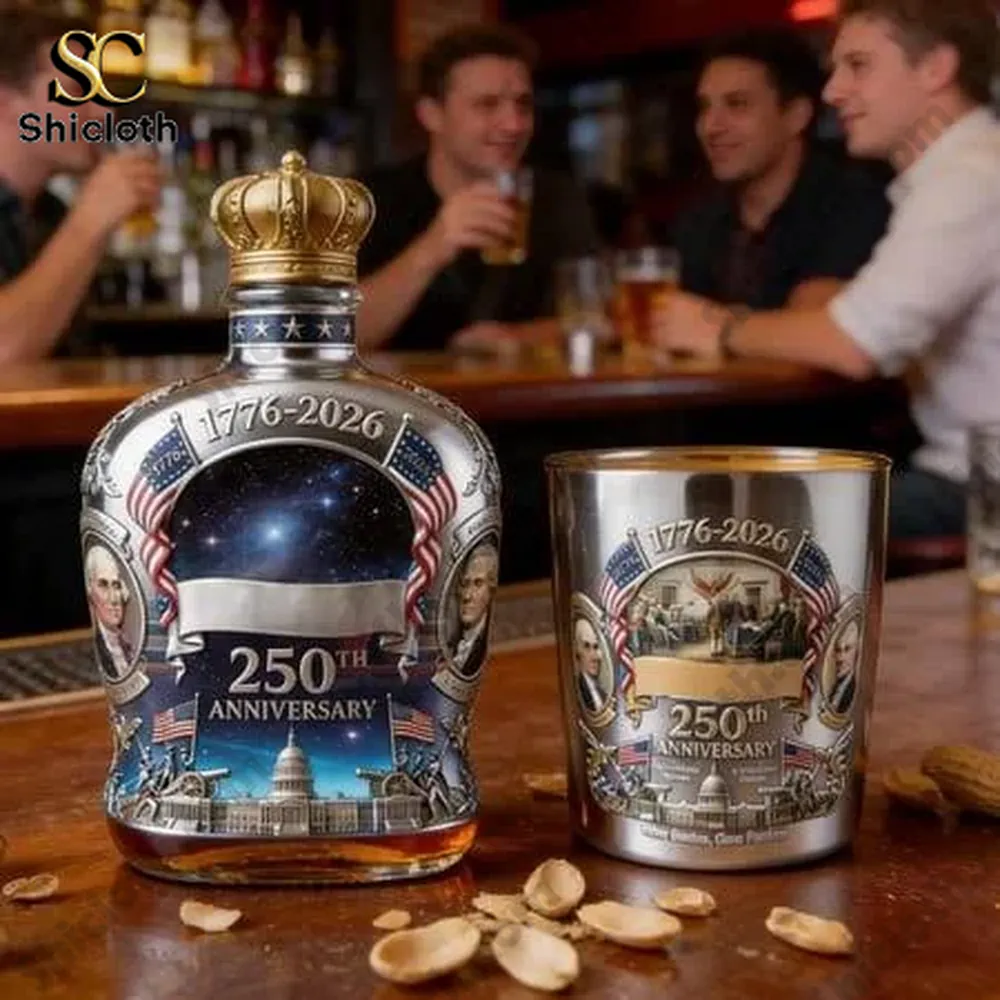 patriotic anniversary whiskey bottle beside commemorative metal cup on bar table!