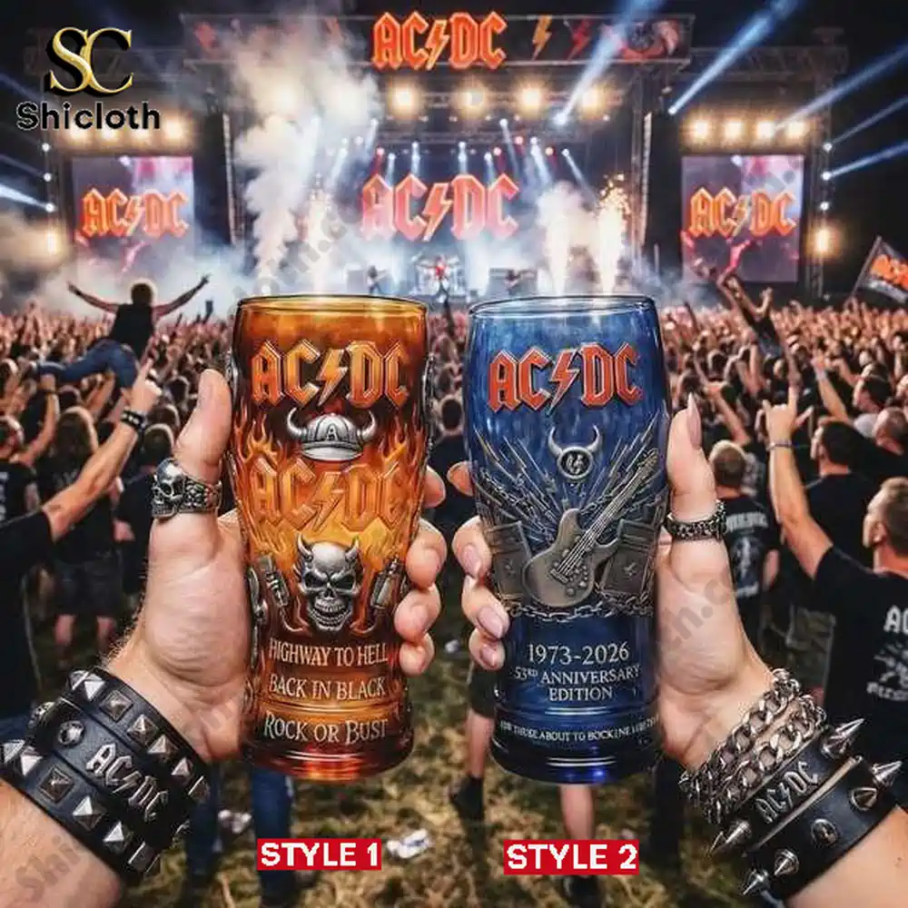 Hands holding AC DC anniversary rock beer glasses at a live concert crowd!