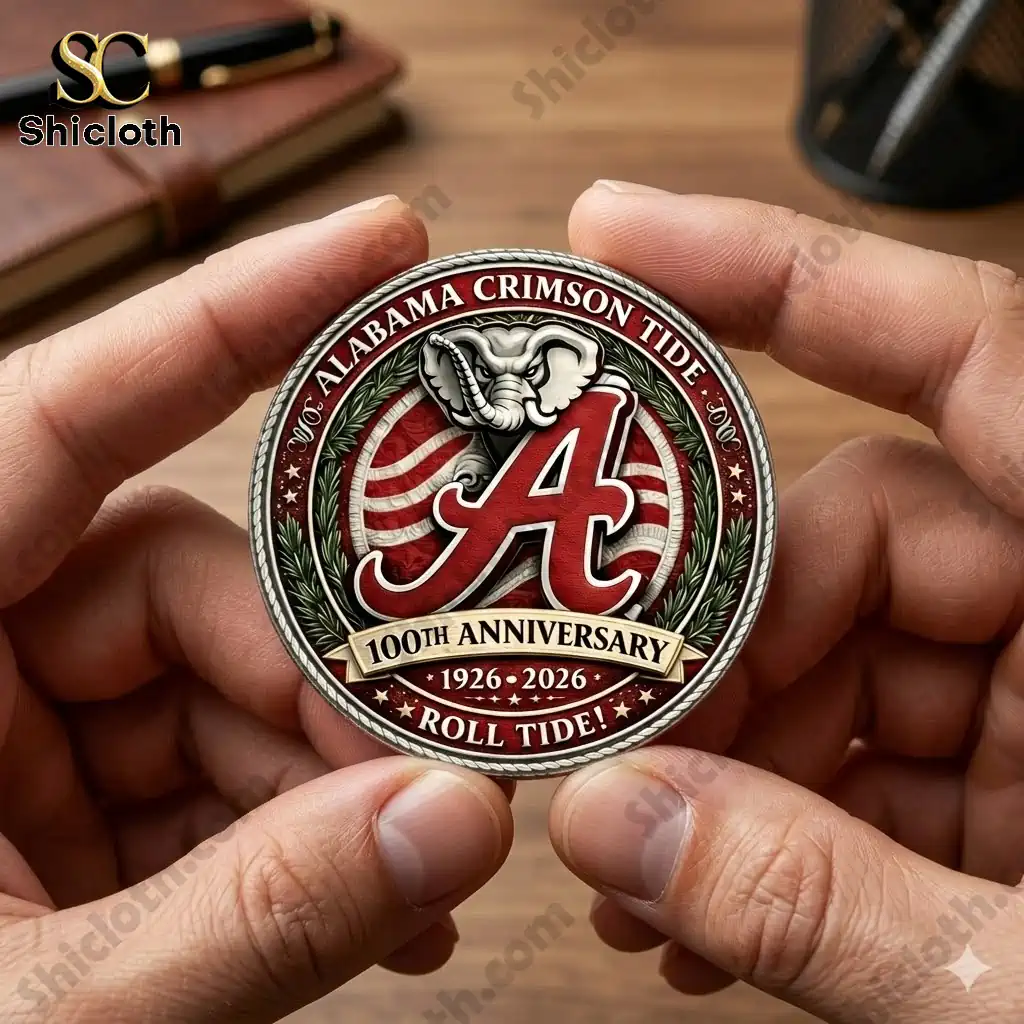 Alabama Crimson Tide 100th Anniversary commemorative coin held in hands