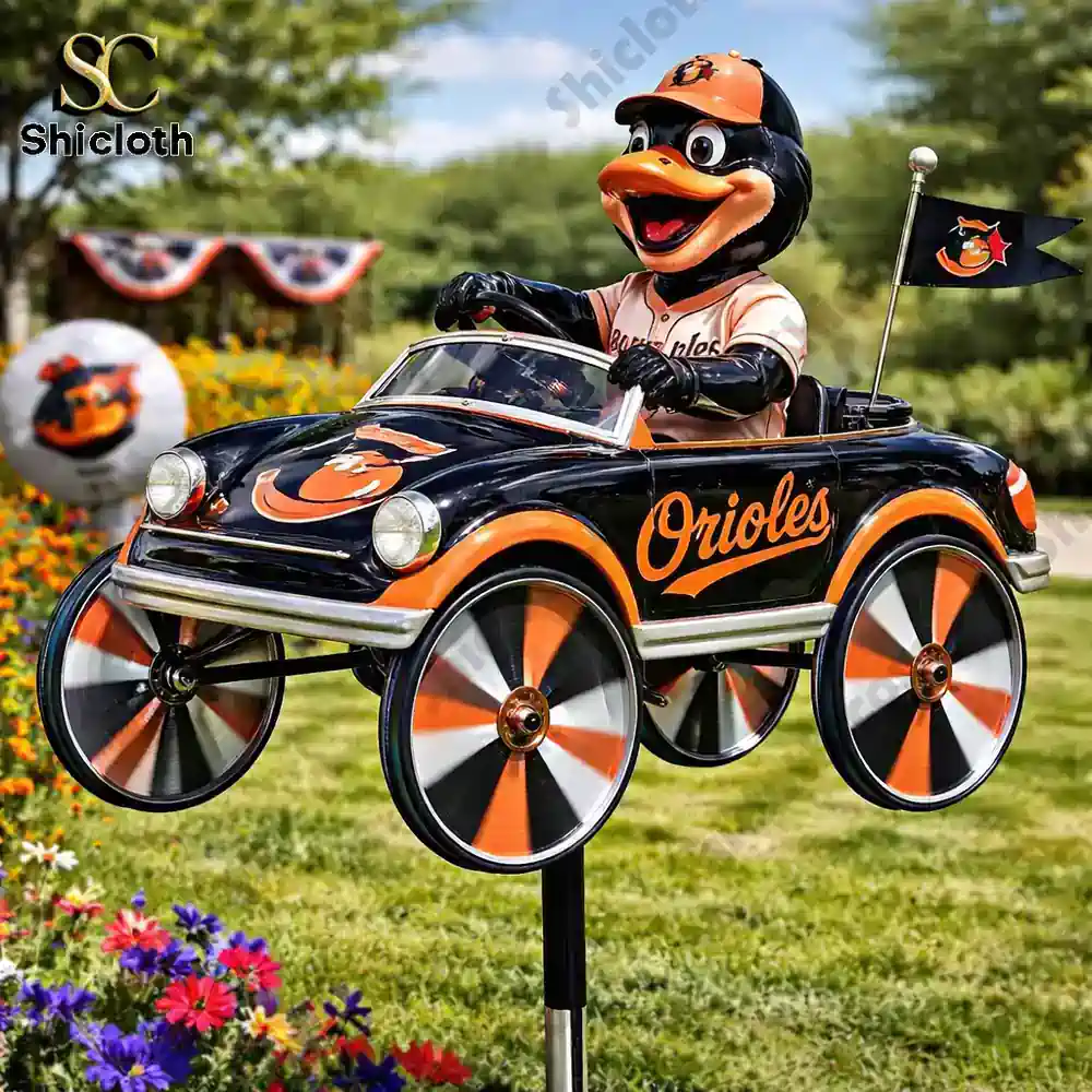 Baltimore Orioles bird mascot driving a car wind spinner in a colorful garden