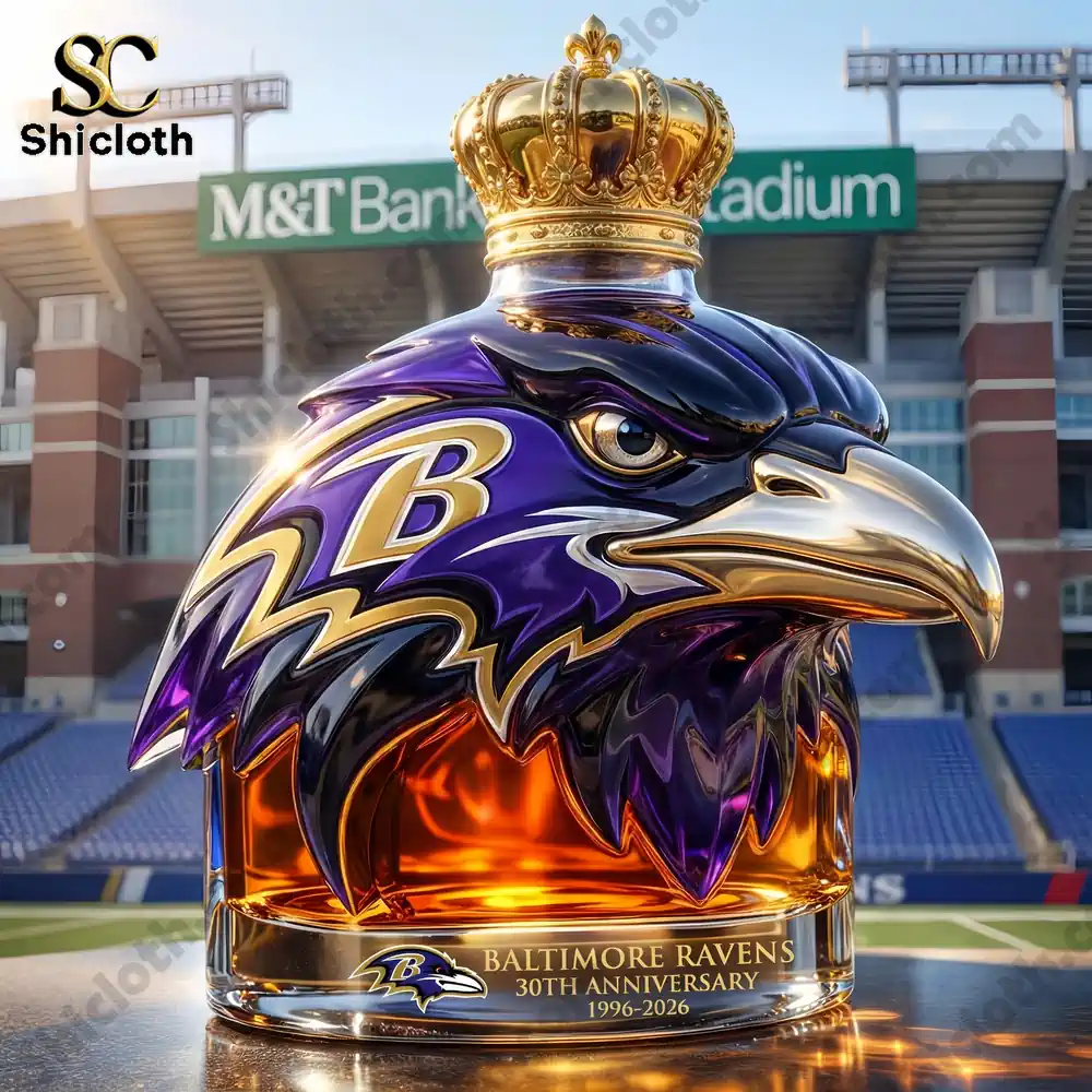 A close-up of the Baltimore Ravens 30th Anniversary commemorative bottle, with an eagle-shaped design and a gold crown on top.