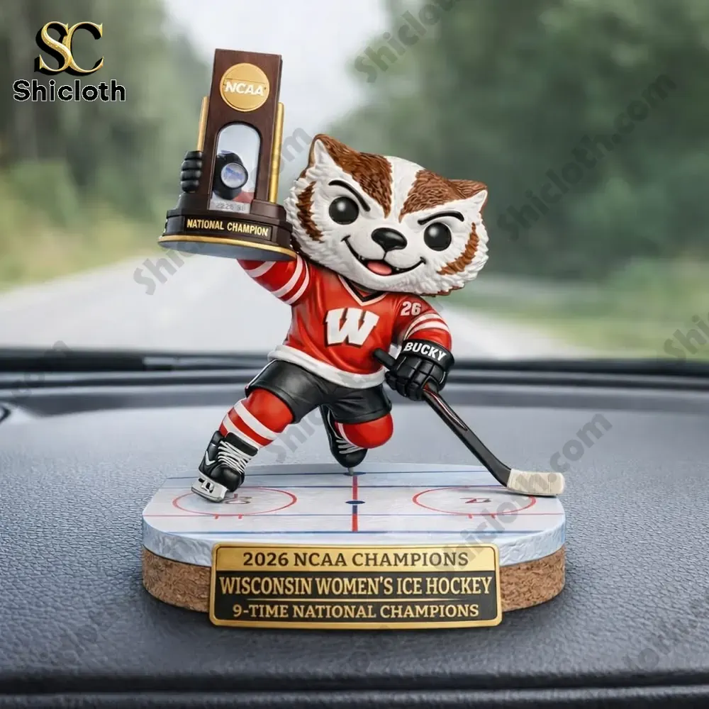 Wisconsin hockey mascot figure holding championship trophy on car dashboard!