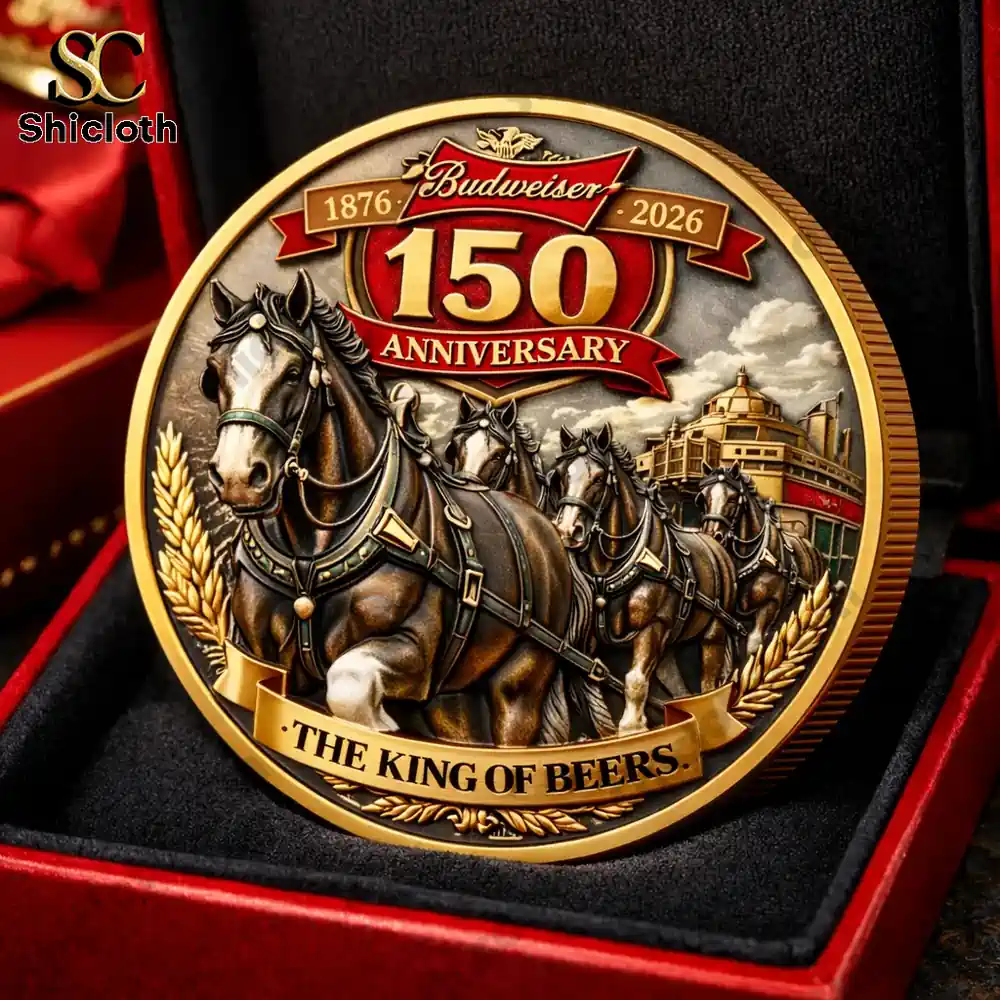 Budweiser anniversary coin with strong horses pulling a classic beer wagon in a detailed gold design!