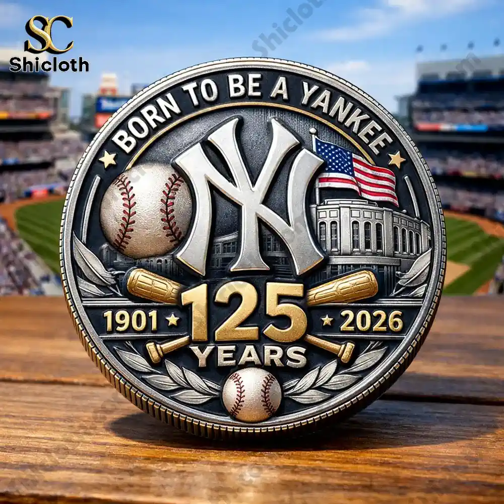 shicloth yankees anniversary coin on table with baseball stadium background!