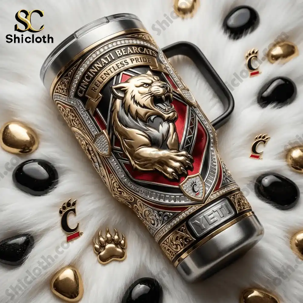 Cincinnati Bearcats Relentless Pride Luxury 40oz Tumbler 3 Cincinnati Bearcats Yeti tumbler on white fur with accessories
