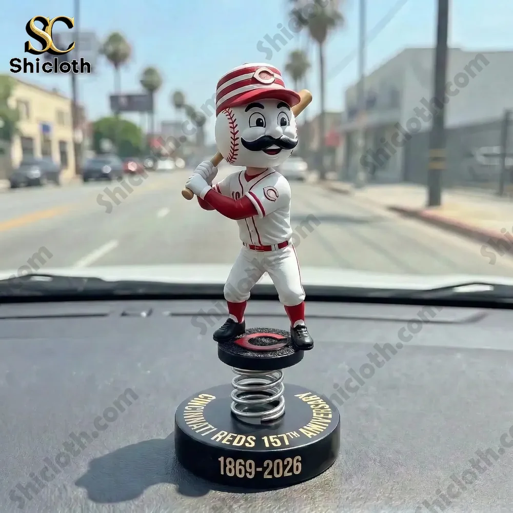 Cincinnati Reds baseball player bobblehead standing on car dashboard with spring base!