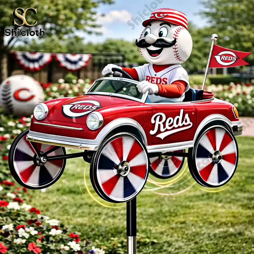 Cincinnati Reds mascot driving red car wind spinner in garden