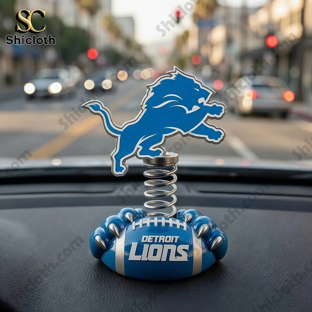 Detroit Lions dashboard bobblehead with lion logo on spring and football base!