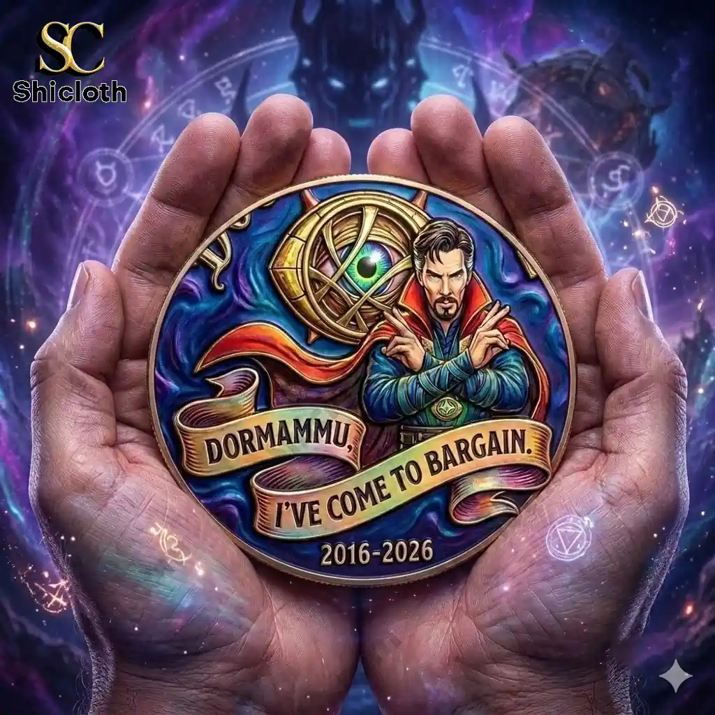 Doctor Strange anniversary coin held in two hands against a mystical cosmic background!