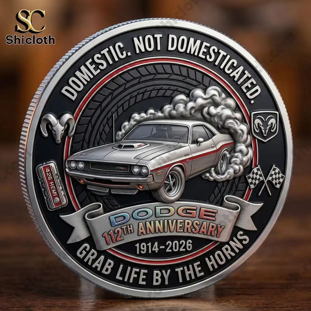 Close up of Dodge 112th Anniversary commemorative coin featuring classic Dodge Challenger design!