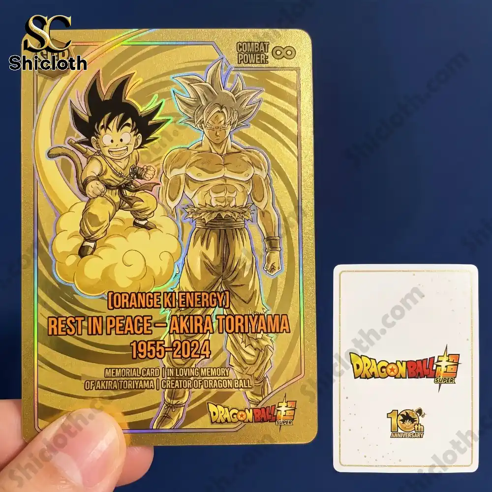 Golden memorial Dragon Ball card featuring Goku honoring Akira Toriyama