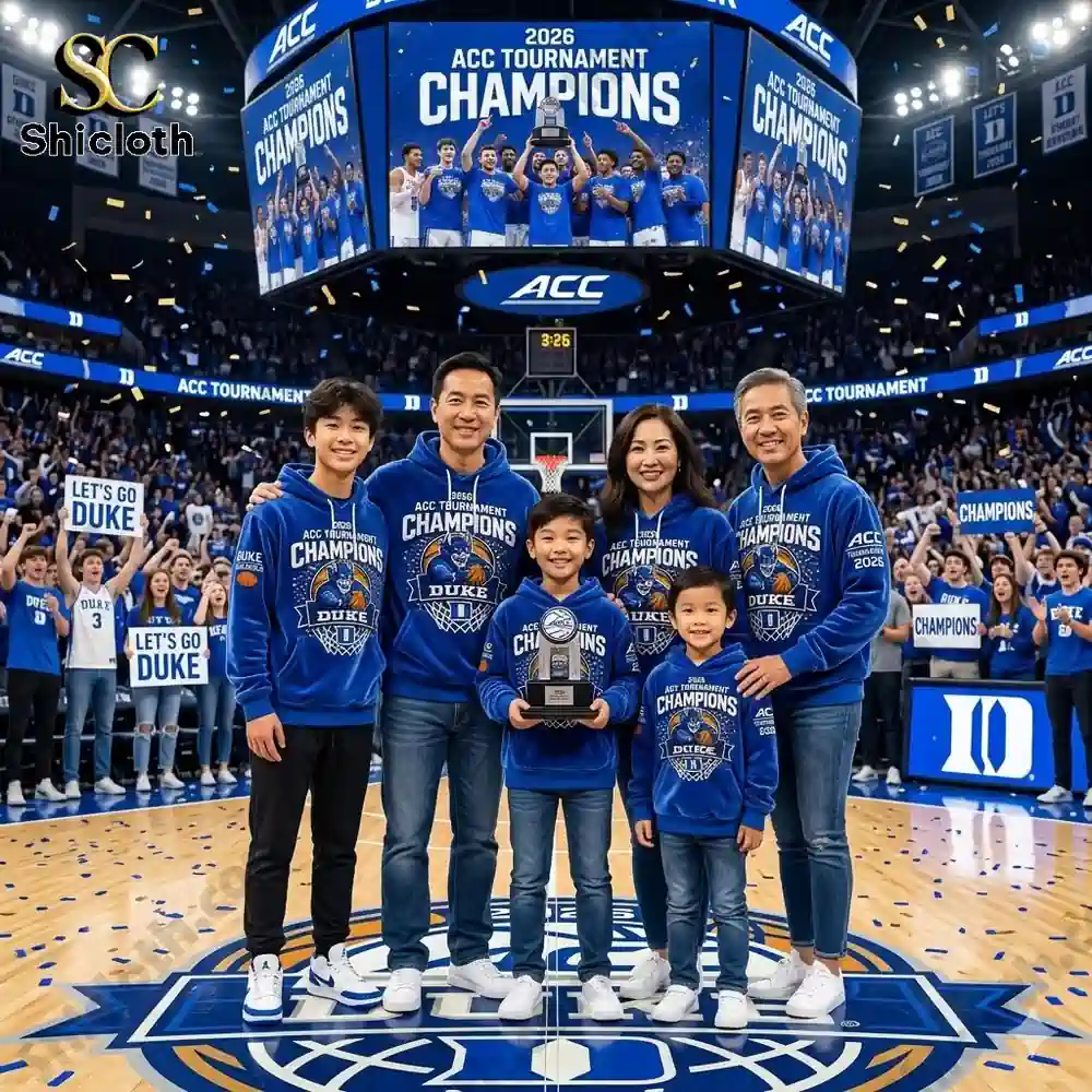 Family wearing Duke champions hoodies celebrating on basketball court