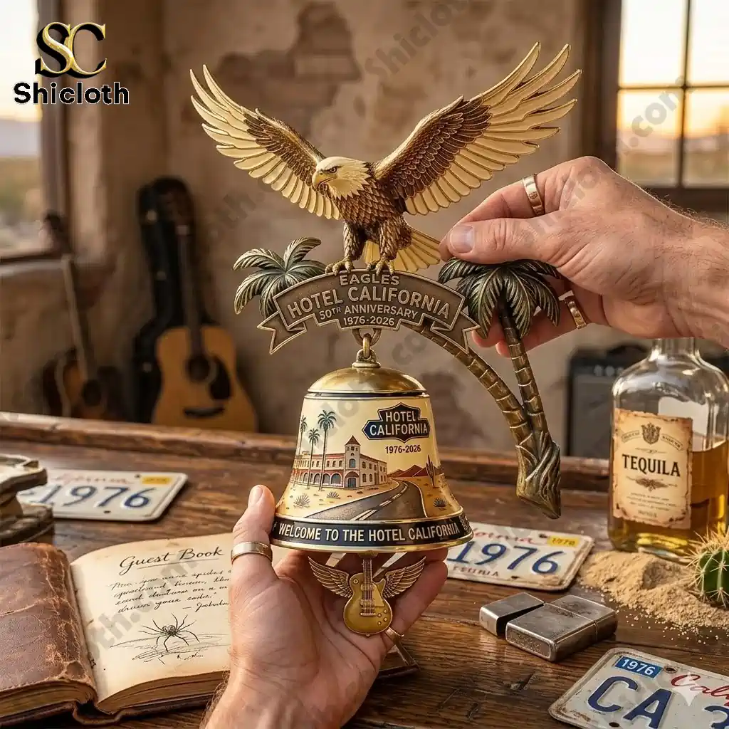Eagles Hotel California anniversary wall bell with golden eagle and palm trees displayed indoors!