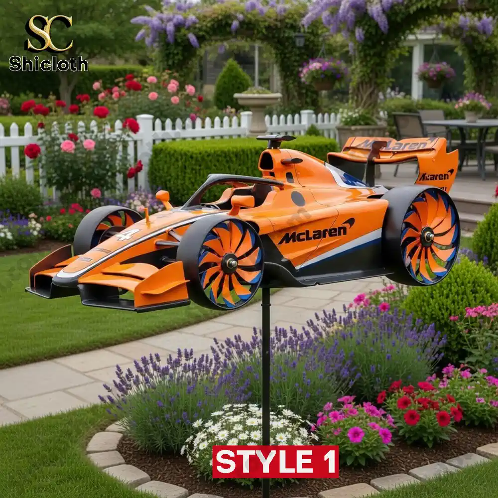 Formula 1 Team Wind Spinner For Garden 3 Orange formula one wind spinner placed in a colorful garden