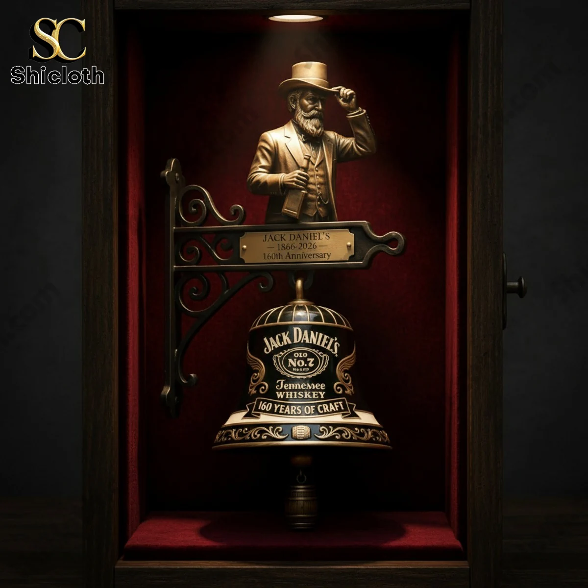 Jack Daniels 160th Anniversary wall bell displayed in a red velvet showcase cabinet!