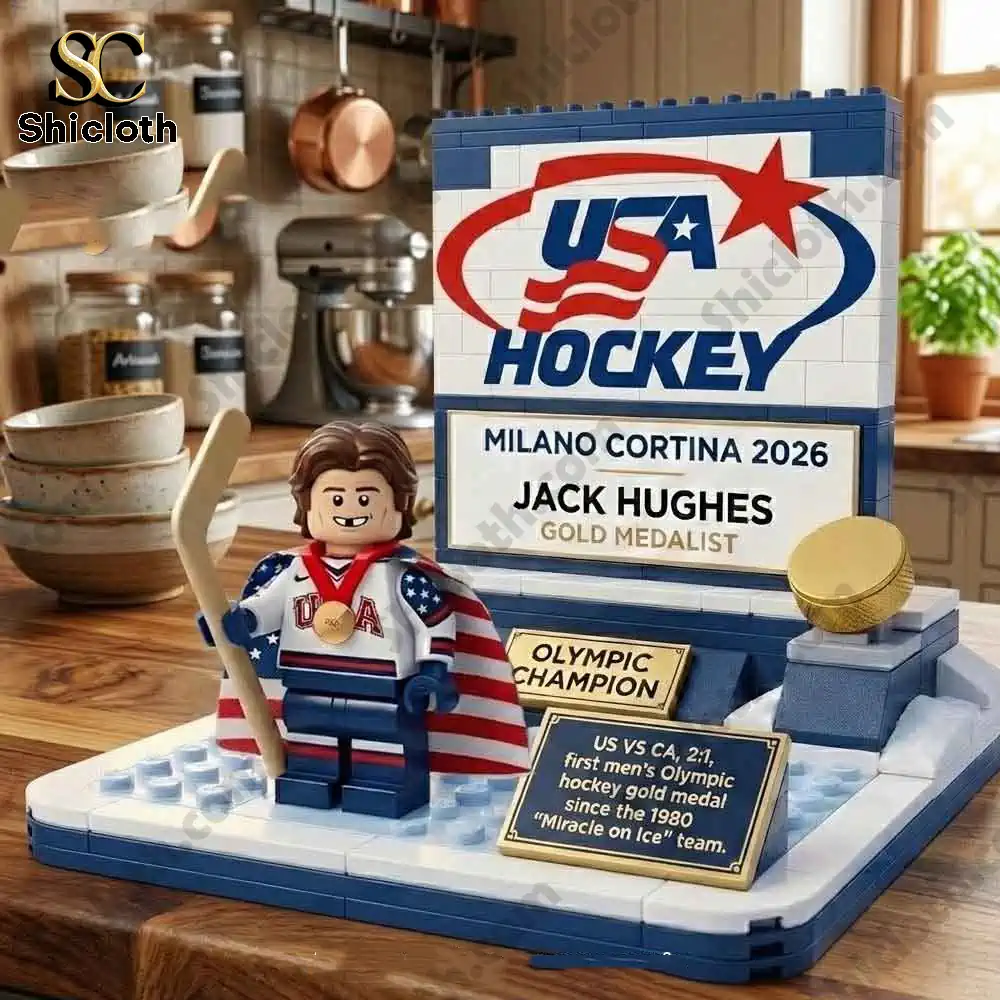 Close up of Jack Hughes USA Hockey 2026 Olympic Gold Medalist brick display set on a kitchen table.