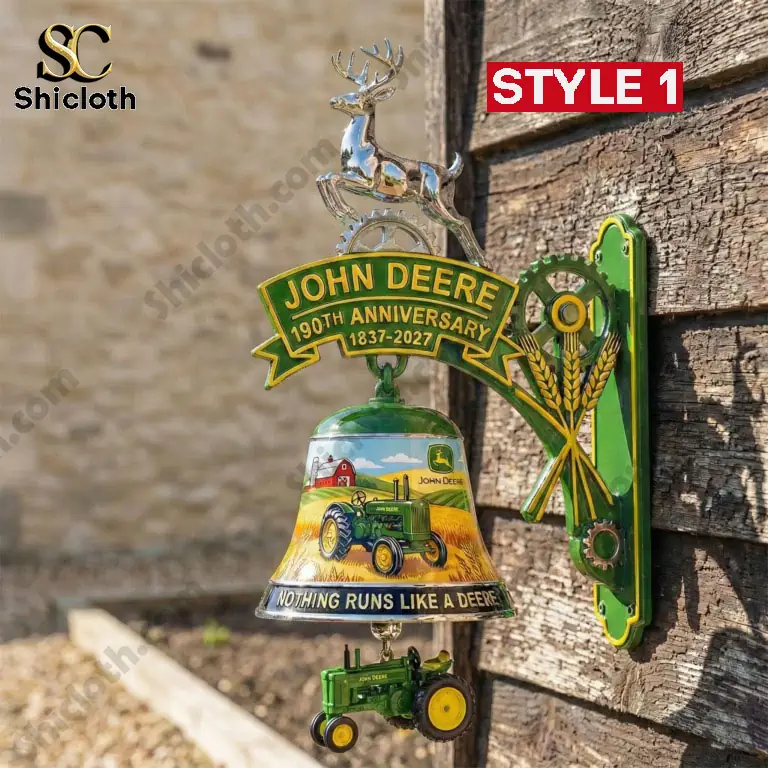 John Deere 190th anniversary wall bell style one mounted on rustic wooden wall with green bracket!