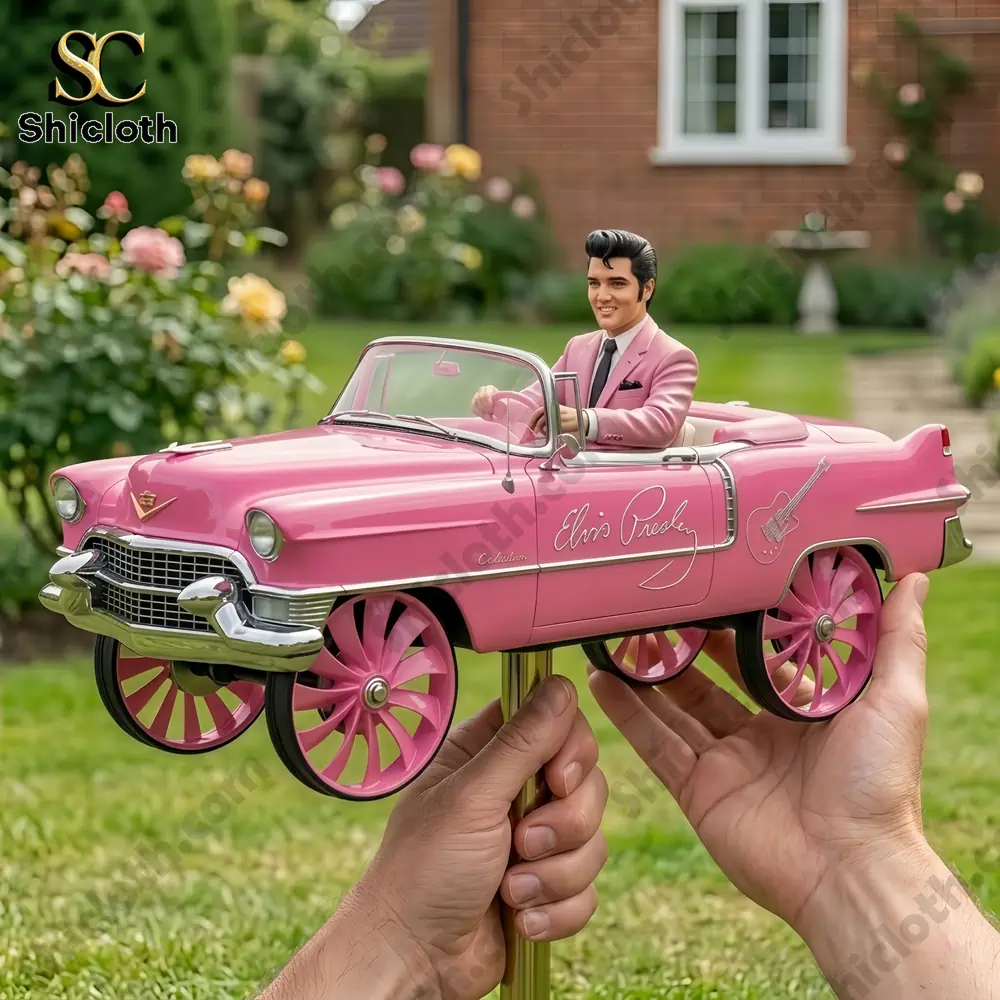 Close up pink cadillac wind spinner with driver figure!