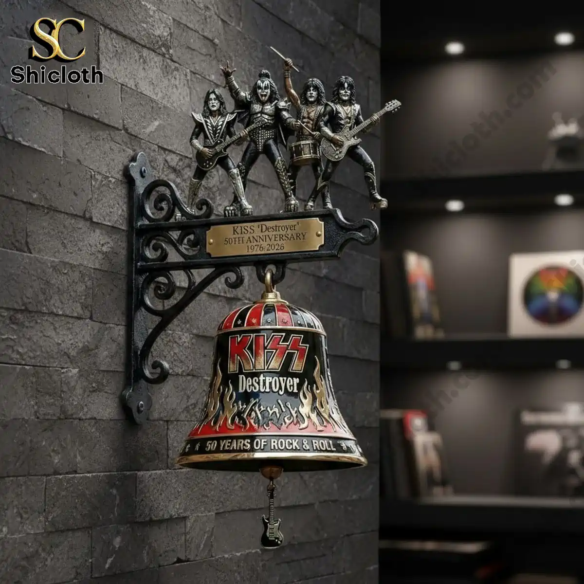 KISS Destroyer 50th Anniversary cast iron wall bell mounted on stone wall in modern display room