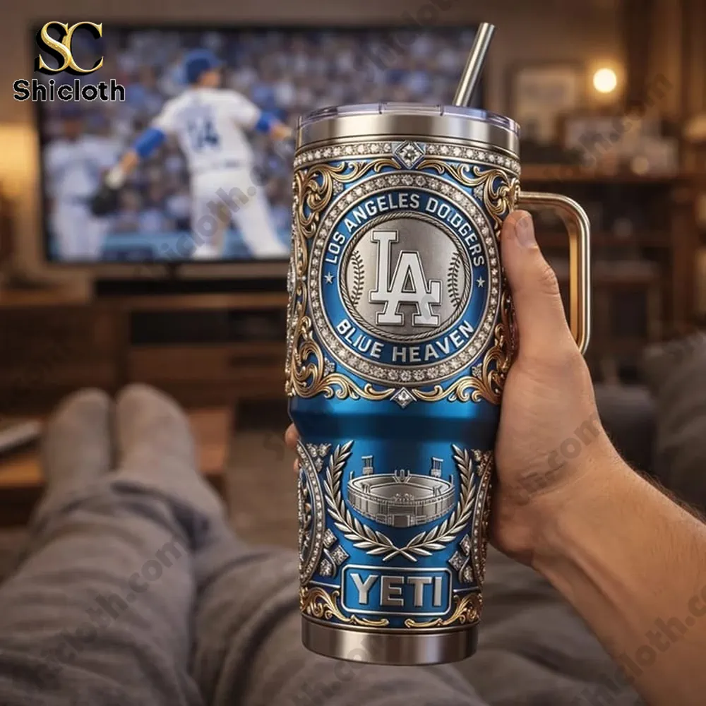Hand holding Los Angeles Dodgers Blue Heaven tumbler while watching game