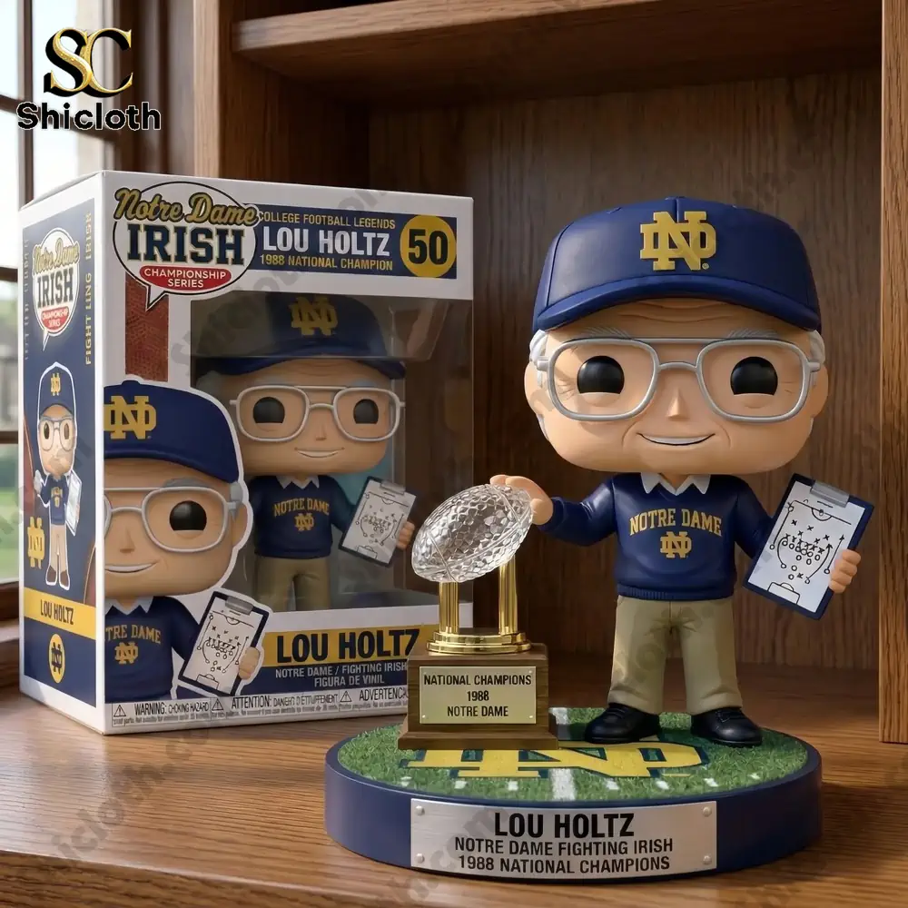 Lou Holtz Notre Dame coach collectible figure with championship trophy displayed on wooden shelf!