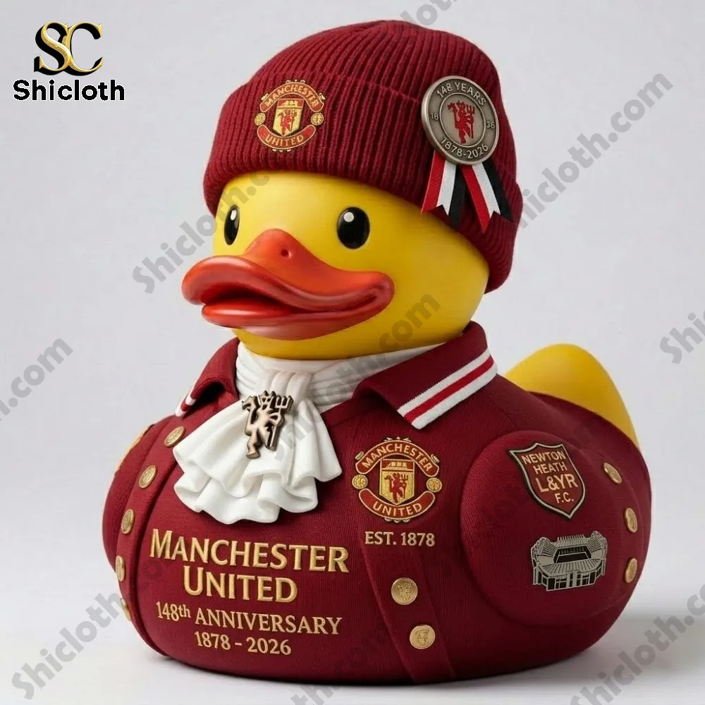 Yellow duck collectible wearing red Manchester United outfit and hat with anniversary badge!