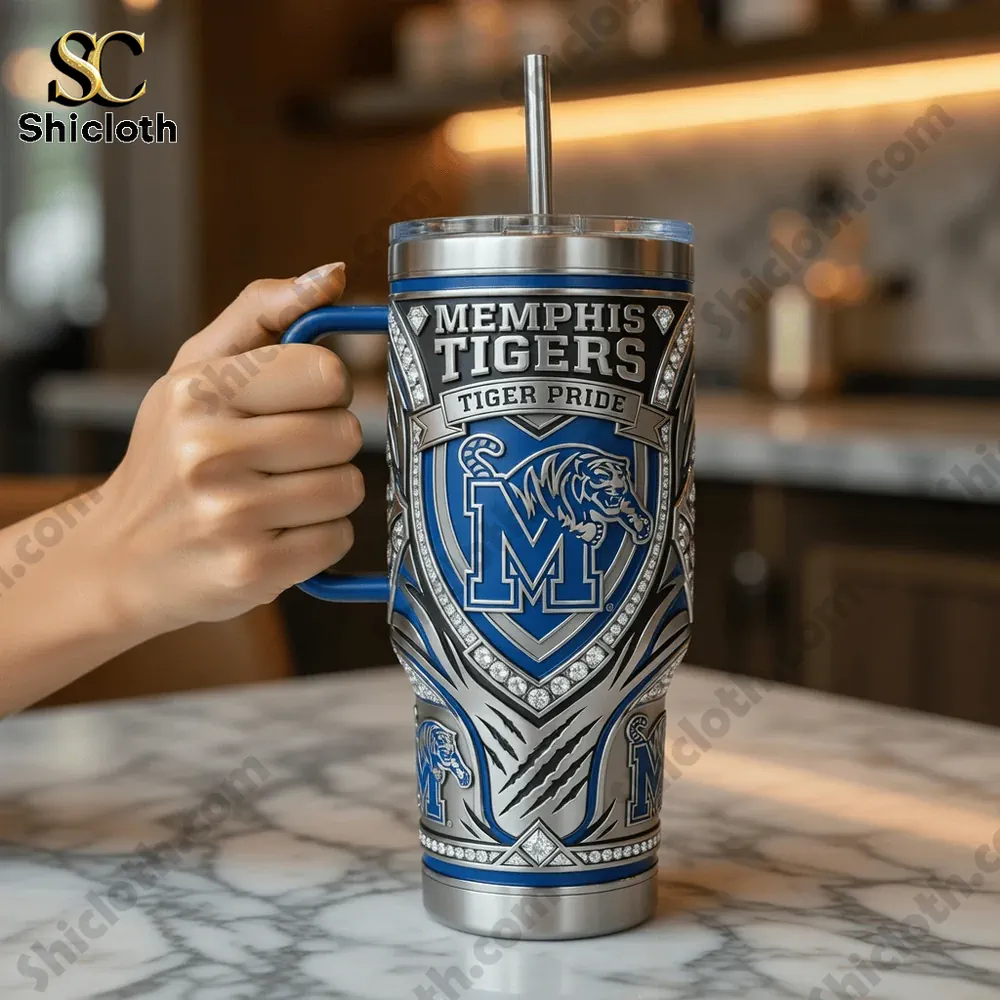 Memphis Tigers 40oz Tervis Tumbler With Handle 3 Hand holding Memphis Tigers tumbler in a modern kitchen setting!