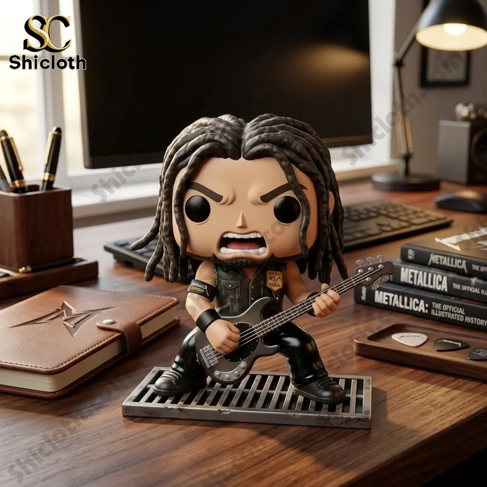 Metallica Robert Trujillo 45th Anniversary Funko Pop 3 Robert Trujillo Metallica style vinyl figure standing on desk with music books and guitar accessories!
