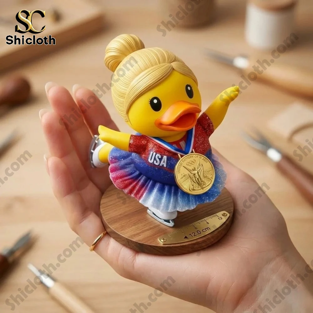Cute Shicloth olympic skating duck figure with medal standing on wooden base in hand!
