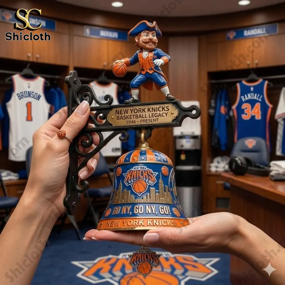 Hand holding New York Knicks basketball wall bell with mascot figure in team locker room!