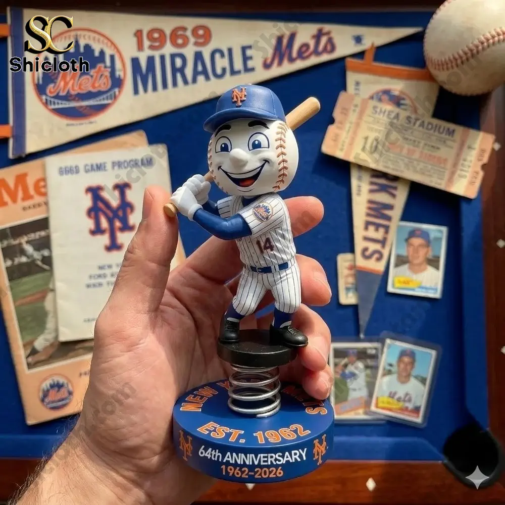 New York Mets baseball mascot bobblehead on spring base held in hand with Mets memorabilia background by Shicloth!