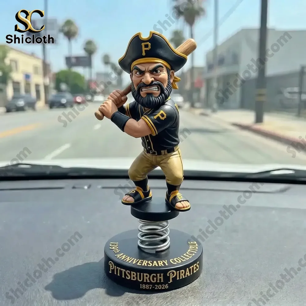 Pittsburgh Pirates pirate baseball bobblehead collectible from Shicloth displayed on car dashboard!