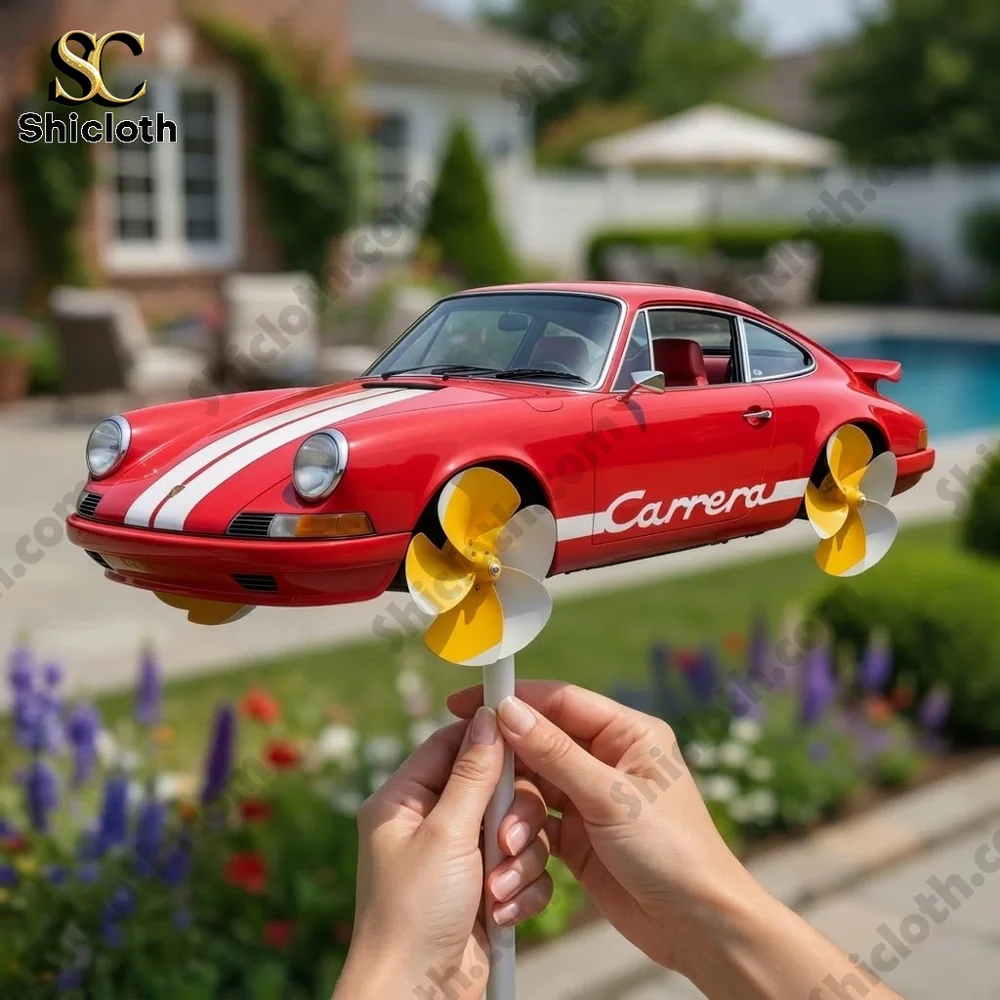 Close up of red Porsche Carrera style wind spinner held in hands!
