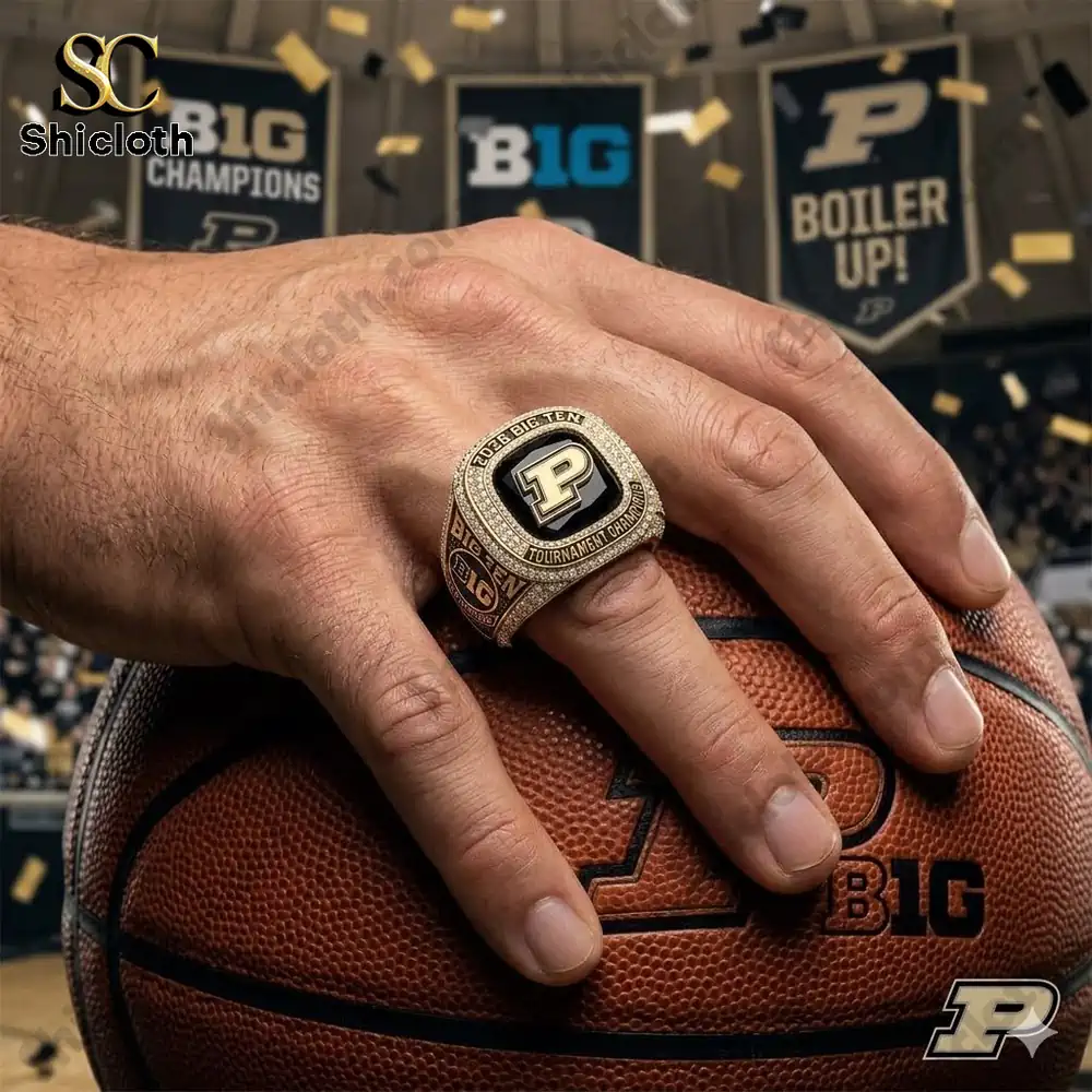Hand wearing Purdue Boilermakers championship ring holding a basketball!