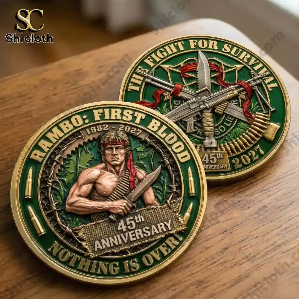 rambo first blood anniversary challenge coins on wooden surface