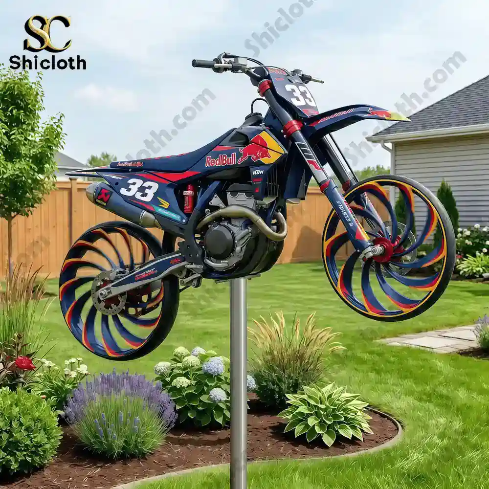 Motocross bike garden wind spinner with colorful wheels in a backyard