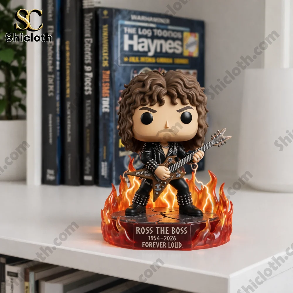Rock guitarist figure standing on a flame base on a bookshelf!