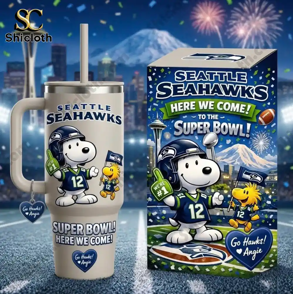 Seattle Seahawks Snoopy Woodstock Super Bowl tumbler with straw displayed beside themed product box!