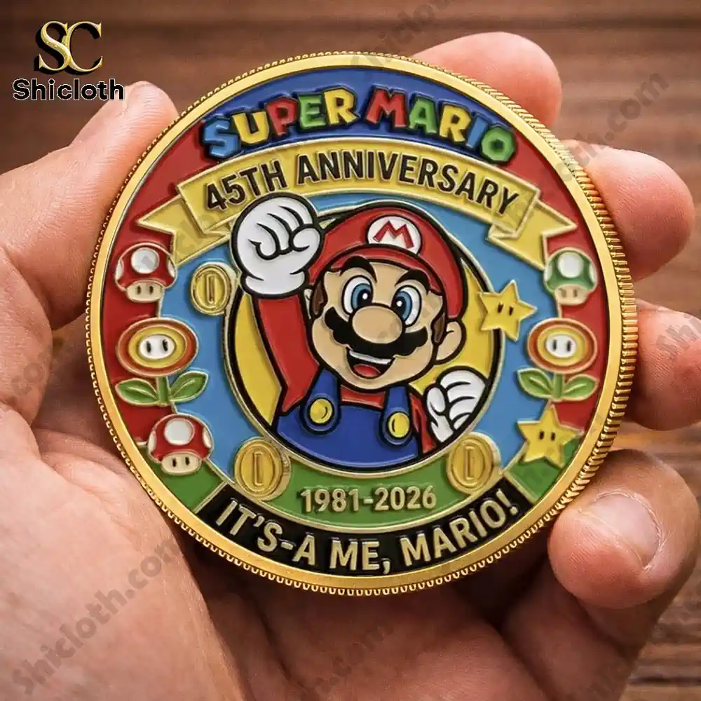Mario anniversary collectible coin by Shicloth held in hand with gold edge!