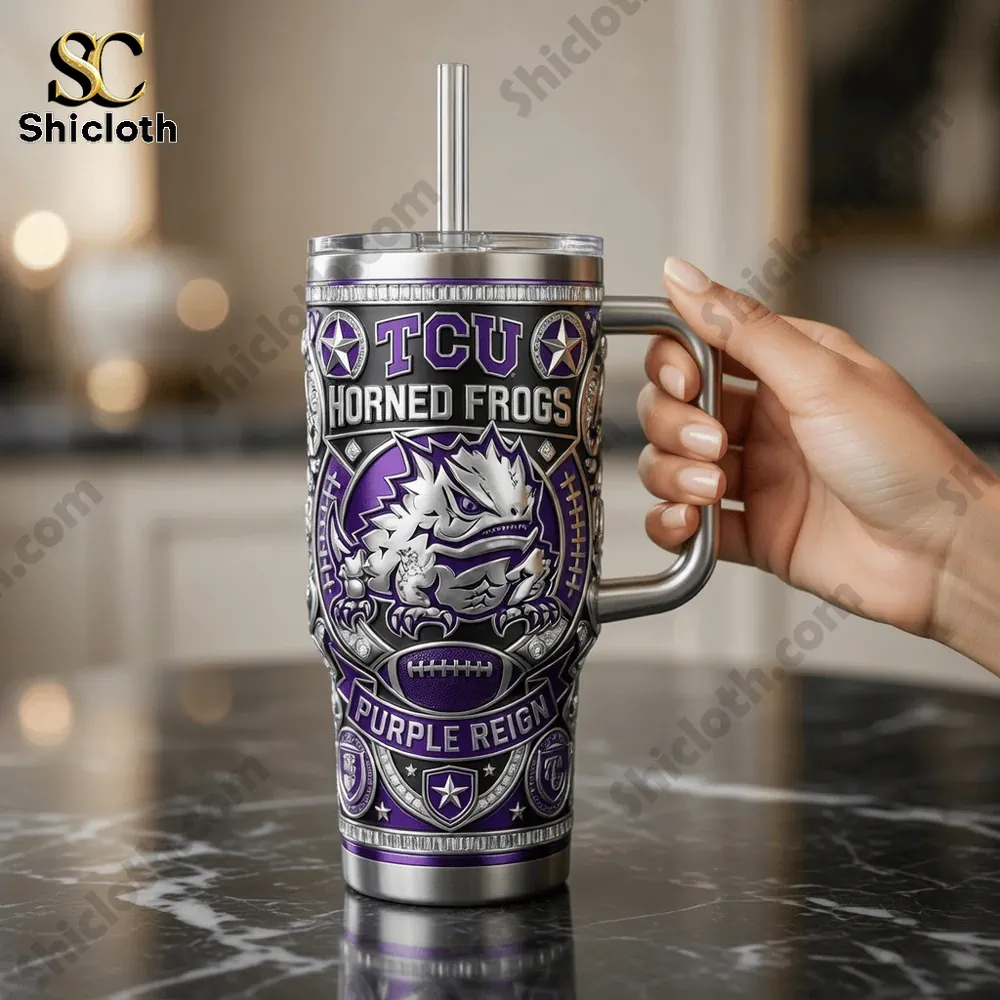 Tervis TCU Horned Frogs. 40oz Tumbler With Handle 3 Hand holding TCU horned frogs purple tumbler in kitchen setting!