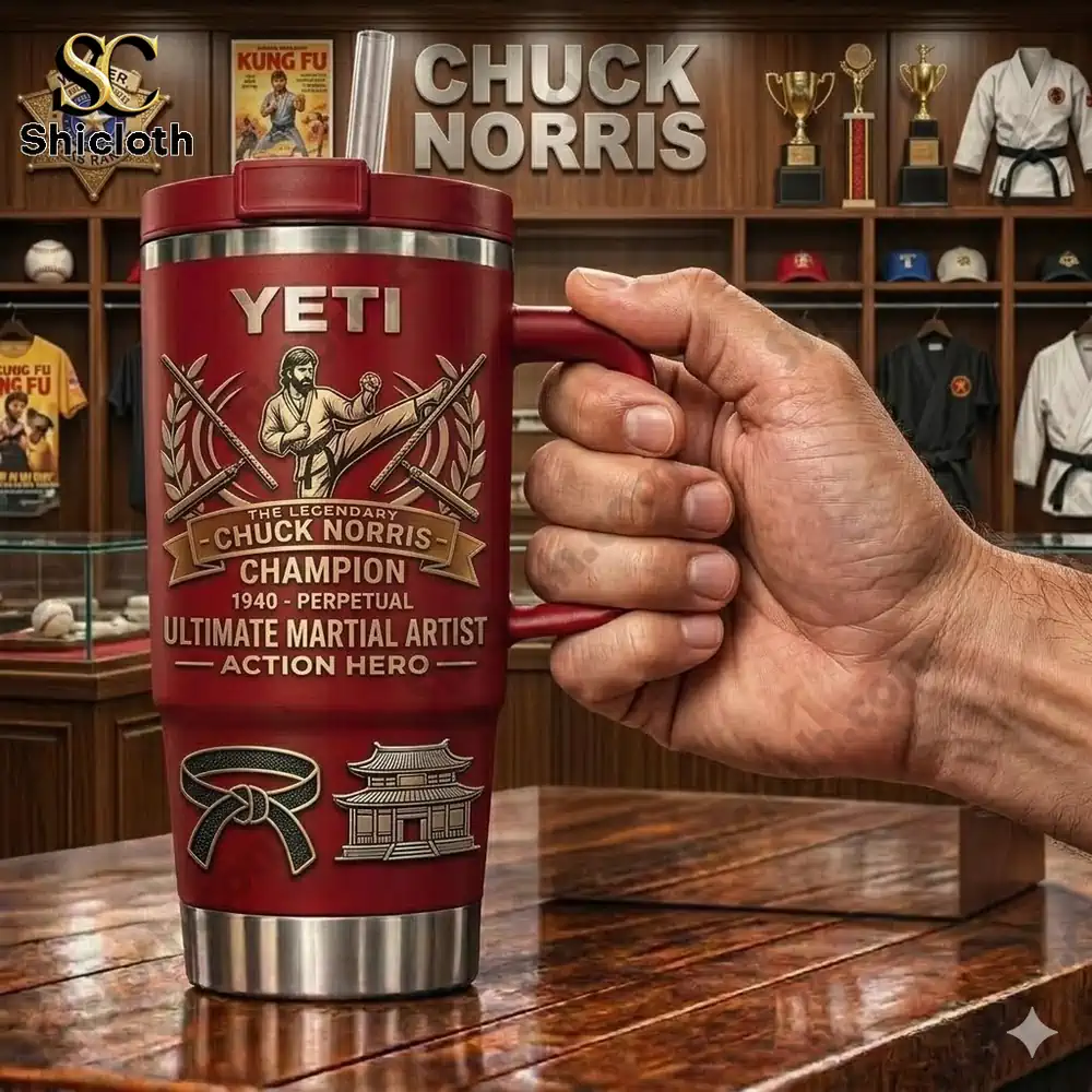 Hand holding red Yeti tumbler with Chuck Norris martial arts design in shop
