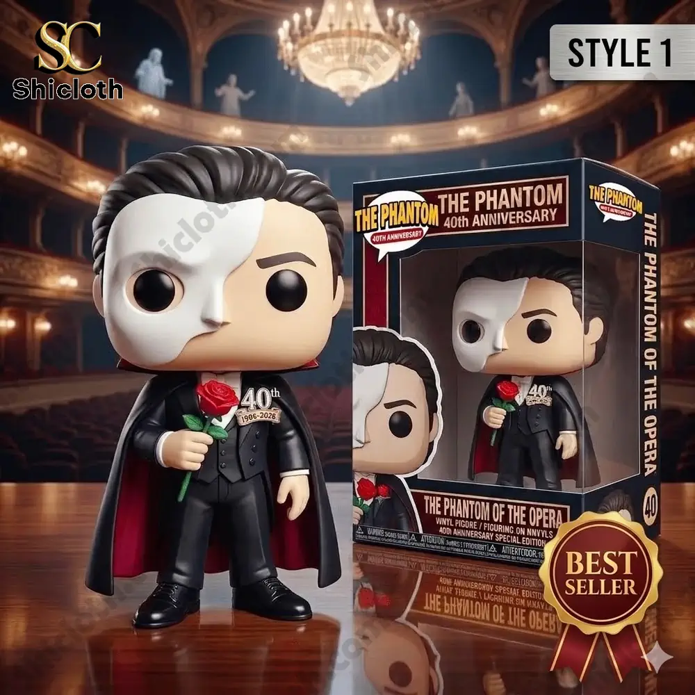 Phantom Of The Opera anniversary collectible figure holding red rose displayed with product box on theater stage!