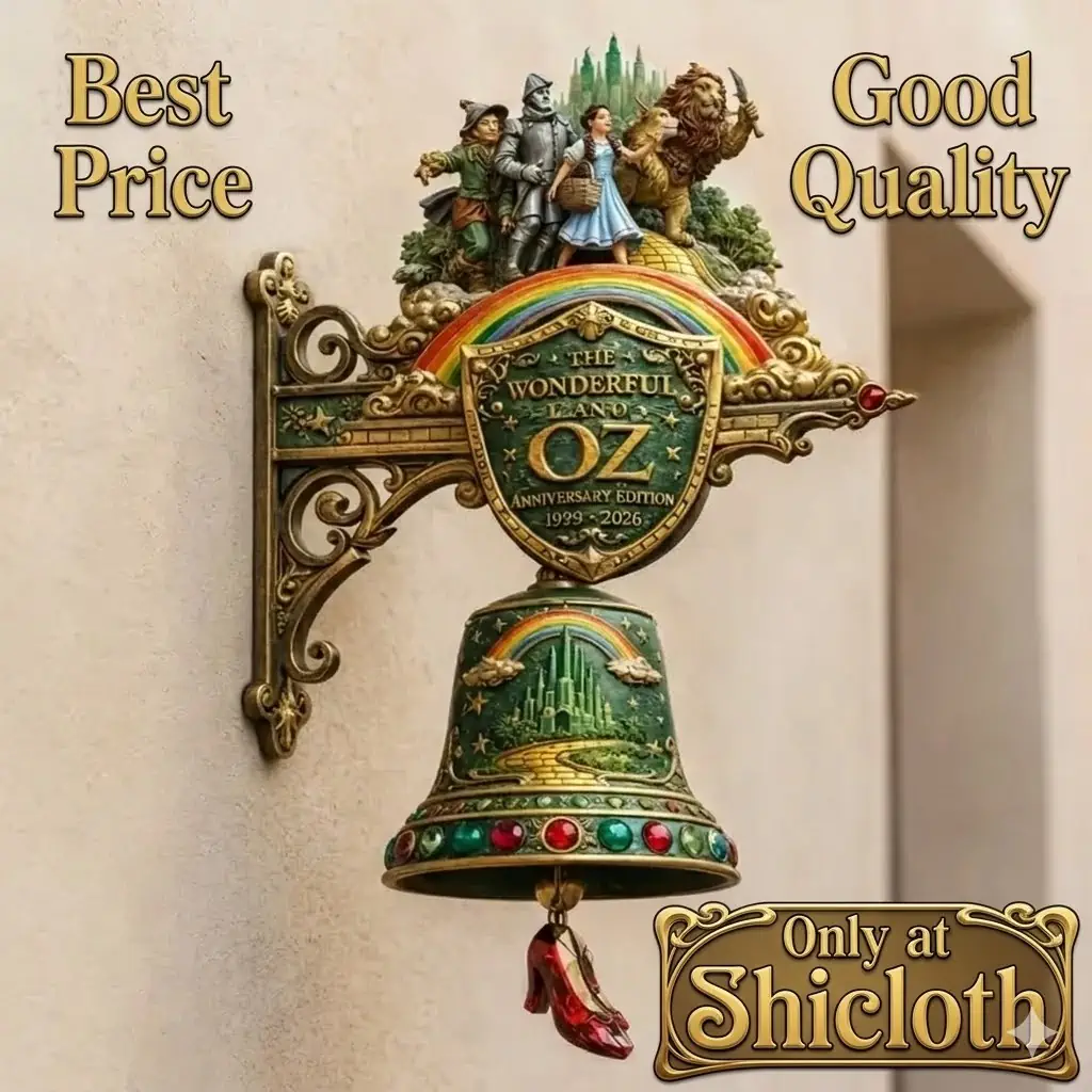 Decorative wizard of oz wall bell mounted on wall with dorothy lion scarecrow tin man and rainbow details from shicloth shop!