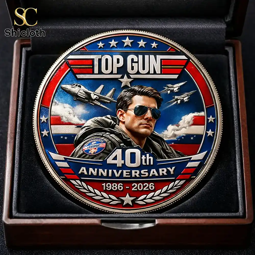 Top Gun anniversary coin with pilot portrait and fighter jets in display box!
