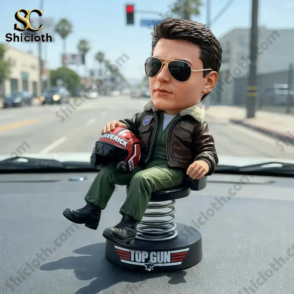 Top Gun Maverick pilot bobblehead sitting on car dashboard holding helmet Shicloth!