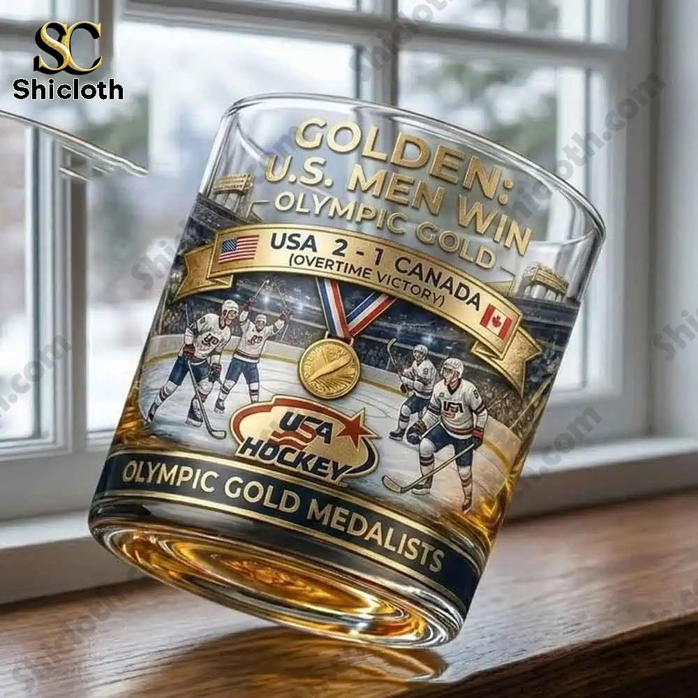 Close view of USA Hockey Olympic Gold whiskey glass near window!